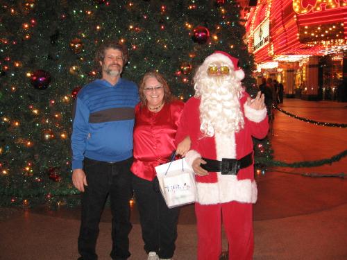 Even Santa Loves Vegas - This was taken Christmastime 2006 at the Freemont Experience. Another must while you are in Las Vegas. Even Santa loves it there.