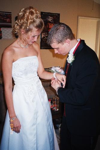 My daughter's Jr Prom photo - This is one of my favorite photos (from my collection) of my daughters Jr prom in 2003. It took us all day to create the look, but she looked so lovely, I can already imagine her as a bride. :)