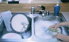 washing dishes - do you fill the sink or wash pan with water for rinsing - or do you rinse under running water? washing dishes - do you fill the sink or wash pan with water for rinsing - or do you rinse under running water?