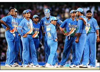 cricket - indian players are in the huddle after falling of a wicket