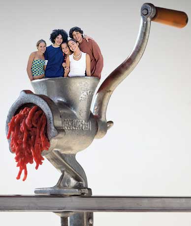 People in a meat grinder - For illustration purposes