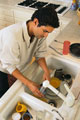 Washing Dishes - Man washing dishes