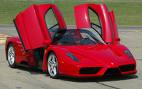 It's a gull-wing Ferrari.. - I like these beautiful,red one creations of Ferrari.Ferrari,absolutely for the rishest men.