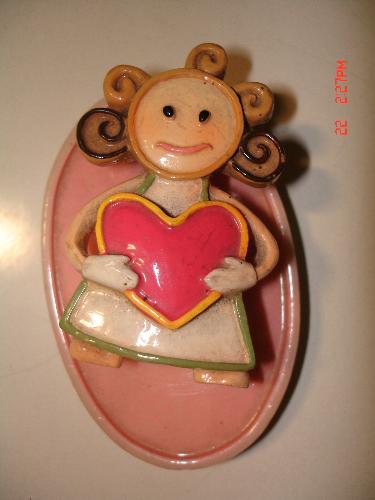 Happy, smiling girl with big heart - This is actually a cover of a trinket box that was a gift to my daughter. Pretty noh.