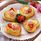 French Toast with Strawberry Butter - Serve this French toast made with Italian bread topped with flavored butter -- a perfect way to say 'I love you.'