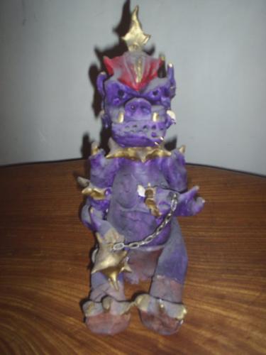 A ceramic dragon - A Chinese Dragon incense holder.