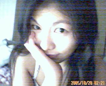 wasted girl! - This photo was taken last october 2005 in my cousin slash auntie's room... it's already 3a.m. in the morning yet i'm still awake!=D