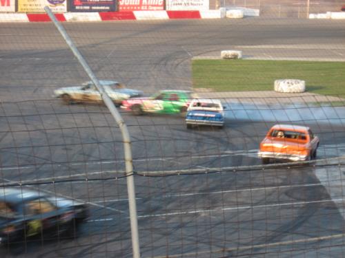 Superb Action Shot - Taken just at the time of the collision in the Figure 8 race. Taken at Elko Speedway in Elko Minnesota USA 4-21-07.  This was a special event called Eve of Destruction.
