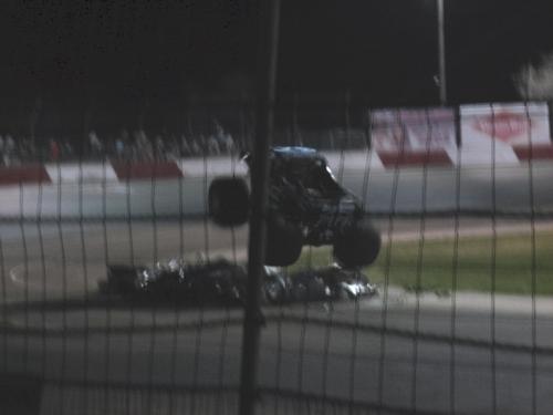 rolling thunder - Rolling Thunder jumping over the junk cars. Taken at Elko Speedway in Elko Minnesota USA 4-21-07.  This was a special event called Eve of Destruction.