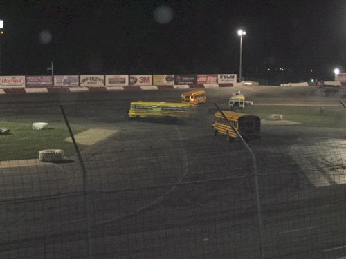 Buses - School Buses in a Figure 8 race. Taken at Elko Speedway in Elko Minnesota USA 4-21-07.  This was a special event called Eve of Destruction.