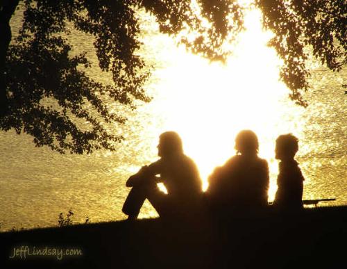 friends - Friends overlooking lake at sunset