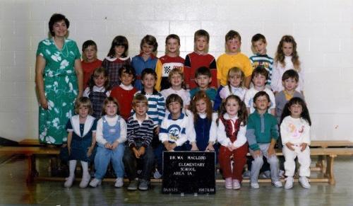 Elementary school - Here in Canada we can the first grade you can go into primary, this is a picture of my primary class. I was six when I wnet to school because I was sick for the whole year I was five.
