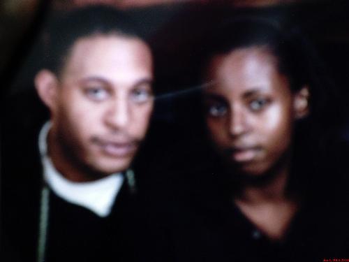 My Husband and Me - This was about three days after we got married and it was taken in Southfield, MI at his mother's home.