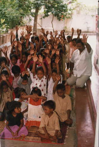 Orphans worshiping God at Christian Orphanage in I - Dr. Samuel has this Orphanage in India where He teaches Children about the Great Love of Father God and His desires for them to have life and life more abundantly through the Blood of Jesus Christ and in His Holy, Powerful and Perfect Name!