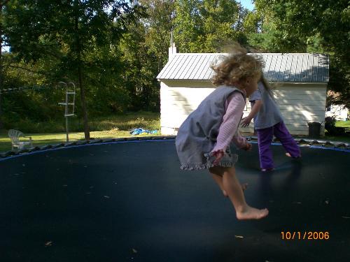 Jumpin' High! - My girls jumping in the backyard!