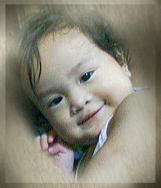 my daughter Aj - this picture was taken on her FIRST BIRTHDAY.