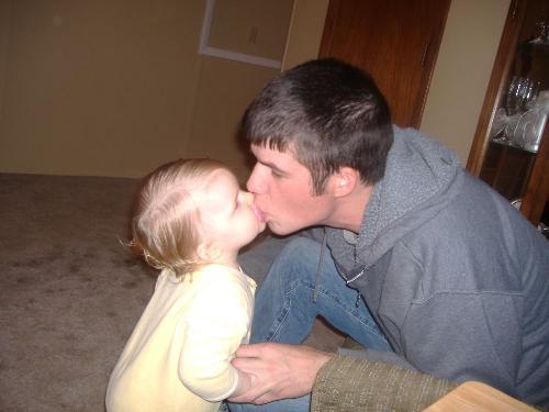 I love my daddy - Marissa takeing her passefier out of daddys mouth.