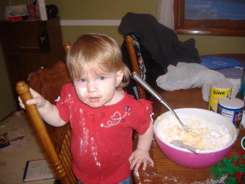 Christams - Making sugar cookies for Santa Clause. Marissa liked eating the batter more than she liked making the cookies!