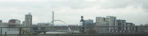 Unusual Glasgow view. - Taken from a car in slow moving traffic going over the Kingston Bridge, part of the M8 motorway.  The picture has been cropped to this size and shows the River Clyde with the new bridge called by Glaswegians as the Squinty bridge as it crosses the river at an angle.