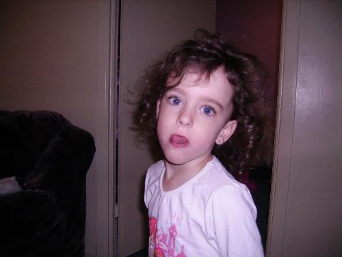 cutie face - my daughter making funny faces and sticking out her tongue.