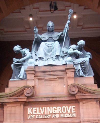 Carving over doorway at Kelvingrove Museum, Glasgo - Kelvingrove art galleries and museum re-opened in July 2006 after a £27.9 million restoration.  Over 1 million visitors went through the doors in the first 6 months.  On display is Dali's, Christ of St John of the Cross, and paintings by Rembrant and Titian.