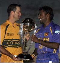 WORLD cup - Both Srilankan and Oz captains holding the WC trophy
