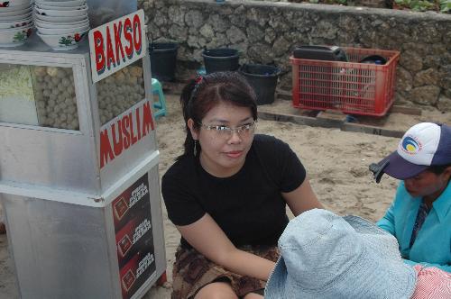 manicure on the street - i was in kuta beach, bali when that pic is taken. was surrounding by people who forced me to use their service. i got dizzy with so many people came arround me so i said yes to the manicure service in order to got rid another pushy vendor streets :)