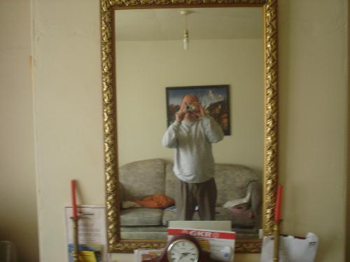 Bob, taking a photograph of bob taking a photograp - Both my husband and I have started taking photographs through mirrors. There is something magical about mirrors and there effect