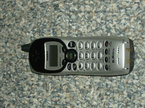 Telephone - Uniden cordless phone, used for long distance. 