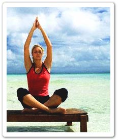 Girl Meditating - meditation by the beach