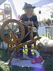 Celebrating Halloween - Demonstration of hand spinning during a late fall festival.