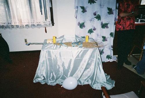 Wedding/handfasting altar - This is the altar from my wedding, set with ring boxes, candles, and our handfasting broom. During the ceremony we moved both candles onto that little platform on the top.