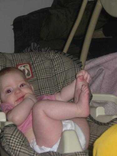 sianna - sianna loves grabing her toes!!**
