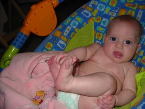 sianna - yup sianna playin with her toes once again!!..lol