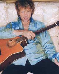Jon with guitar - Jon with a guitar.