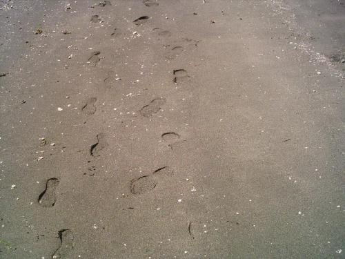 footprints in the sand - there will always be 2 sets of footprints