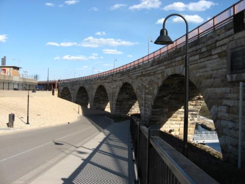 Stone Arch bridge - I've walked this bridge many times. It's always packed on warm sunny summer days. Stone Arch bridge - I've walked this bridge many times. It's always packed on warm sunny summer days.