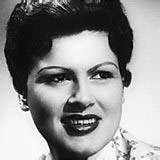 patsy cline - She is the best singer by far it is a shame that she was killed in a plain accident.