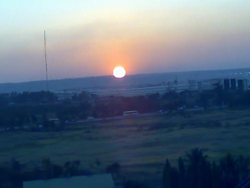 Sunset - A friend took this shot from his cellphone while on the ferris wheel.