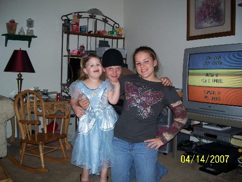 Family - Here is a picture of the youngest in costume posing with he older 2 kids. They just adore her most of the time. They give in to her way to much and so now she is ridiculously spoiled.