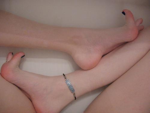 Feet in a Bathtub - There are few sensations quite as wonderous as a relaxing bath at day&#039;s end.