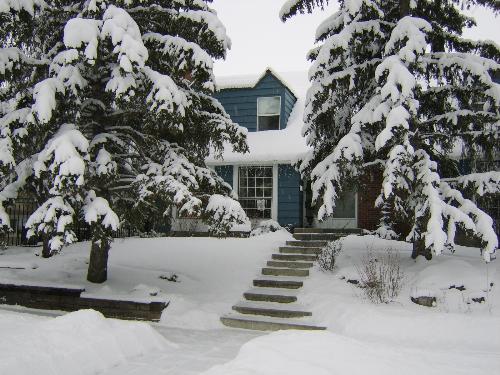 Our home first winter together - This lovely shot of our home taken after a Feb snow storm.The house is of Cape Cod style with Victorian design inside built in 1975.We spent our first Xmas together here. it was so enjoyable to sit next to a raging fire in the big brick fire place opening presents with the family.