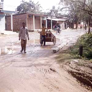 puddles - Shower creating puddles on the road in a small town of India.