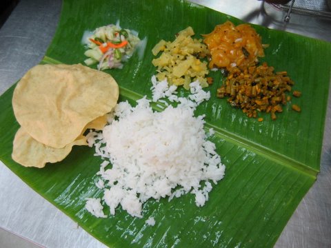 complete vegetarian - Complete vegetarian Indian food serving in a banana leaf.