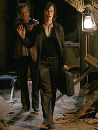 Nina Myers - Nina Myers being held by Jack Bauer.