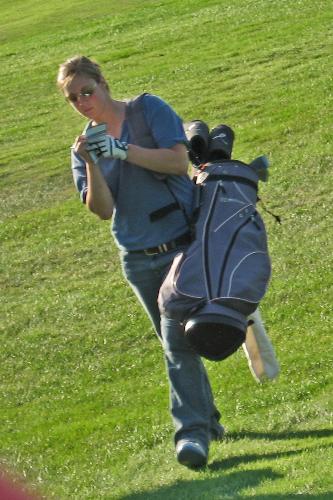 Girl Golfer walking on the course - My 5 year old granddaughter took this photo and I cropped it and printed a copy for her teacher the girls mother and she bought it.