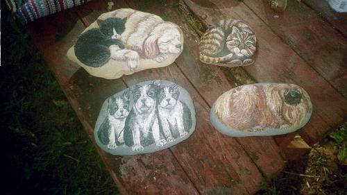 my 'pet rocks' - I like to paint animals on rocks. Here are some of the ones I have done.