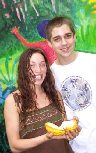 Me in Hawaii with Cacao Fruit - This is a girl I met in the health food store my first day in Hawaii, abundant life natural foods. She was looking at the chocolate there and I asked her if she had ever had raw cacao nibs. She said I EAT THESE EVERYDAY, and we were both laughing and smiling about cacao for the rest of the day. She said she just scored the last 2 cacao fruits from the farmers market and I told her she had to share it w/me, so this is us here, and me with my first ever raw chocolate fruit, it was really tasty ! !!!