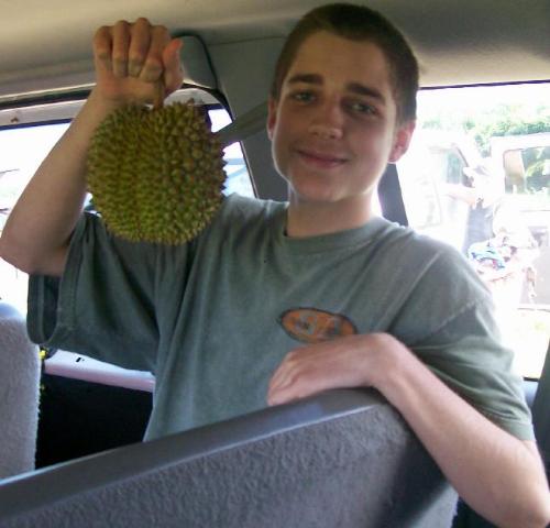 Me and DURIAN - I talked about a durian raid in another picture, this is me with fresh durian. It's spiky and dangerous to hold and you have to wear samurai gear to harvest it, but it tastes sooooo good. It's a lot like custard, really fatty and creamy, but so good for you because it is a fruit ! You can find frozen durian in the states in Asian Markets, but fresh durian is OUTRAGEOUS !