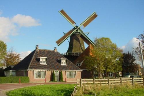 Windmill in Holland - This is a photo of a windmill, located in Holland.